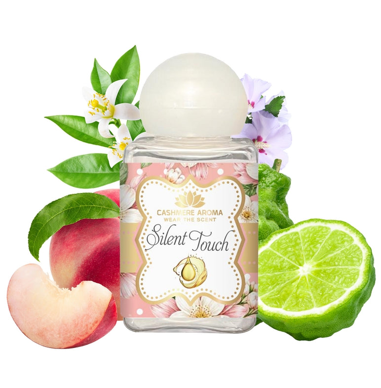 Silent Touch 30 ml mini laundry perfume with peach, bergamot and floral fragrance imagery